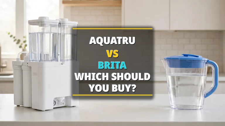 AquaTru countertop RO unit beside a blue Brita-style pitcher on a bright kitchen counter, headline AQUATRU VS BRITA COST PER YEAR 2026